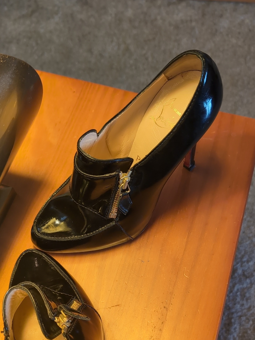 Christian Louboutin Glossy Black Patent Leather Zip-Accent Pumps